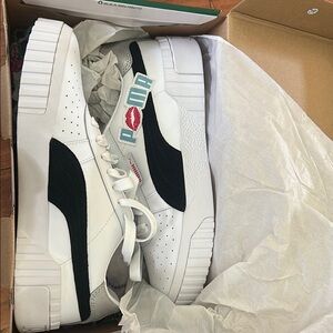 Puma White and Black Logo Sneakers